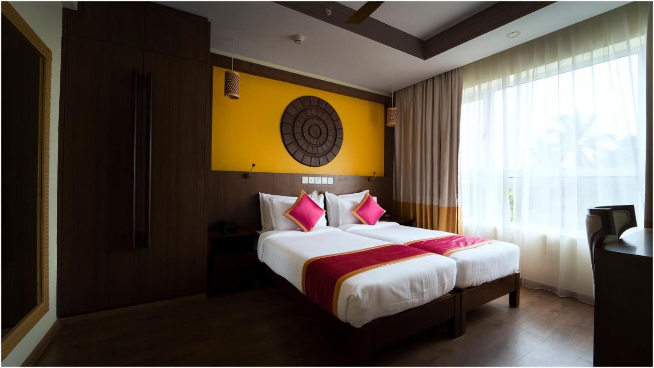 Vivin Luxury Suites Thiruvananthapuram Extérieur photo